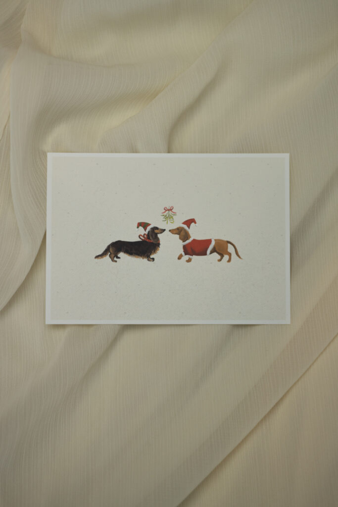 Weihnachtskarte mit Dackeln